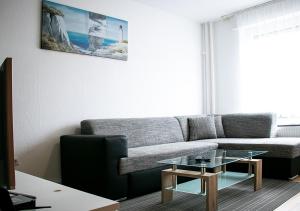 A seating area at 3 Zimmer Appartement