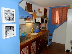 Casa Ático Boutique "La Azotea de Vejer"にあるキッチンまたは簡易キッチン