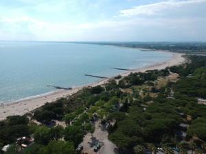 an aerial view of a beach and the ocean at Villa L'Amiraute in Agde