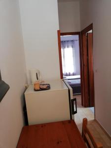 Letto o letti in una camera di Gregory-Vassilis Apartments