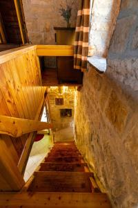 an overhead view of a staircase in a building at Old Small Stone House in Korčula