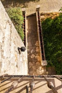 a stone wall with a light on top of it at Old Small Stone House in Korčula