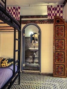 Uma cama ou camas num quarto em Tangiers Hostel