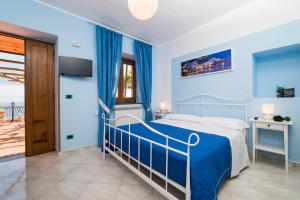 Кровать или кровати в номере Residence Gioia
