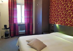 Posteľ alebo postele v izbe v ubytovaní MA Hotel