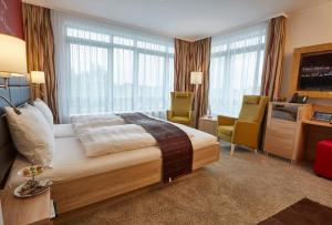 Postel nebo postele na pokoji v ubytování Das Schokoladenhotel