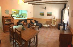 a living room with a couch and a table at Casa Boracay in Los Pastores