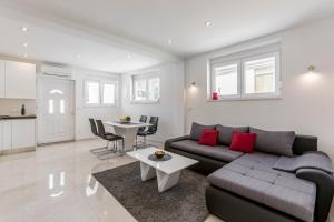 Kuchyň nebo kuchyňský kout v ubytování Apartments Amore