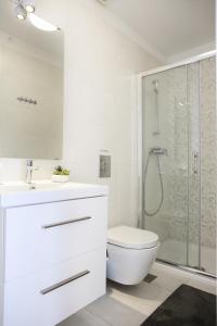 Kúpeľňa v ubytovaní Le Monde Apartment + 23 fotografií