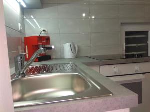 Kuchyň nebo kuchyňský kout v ubytování Lorber house Štinjan + 22 fotografií