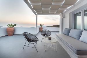 A seating area at Impressive One
