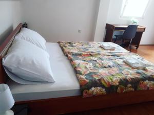 Posteľ alebo postele v izbe v ubytovaní Apartman Lena