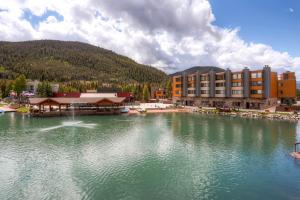 a large body of water in front of a hotel at Lakeside Village by Keystone Resort in Keystone