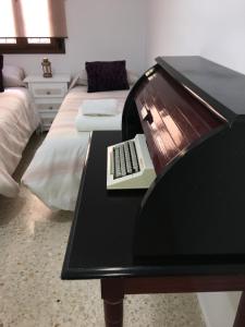 Postel nebo postele na pokoji v ubytování Casa de Corralón