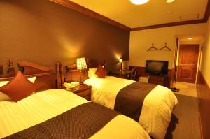 Postel nebo postele na pokoji v ubytování Hotel Gasthof