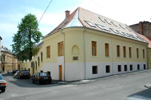 a building on the side of a street at STM3 Apartman in Pécs