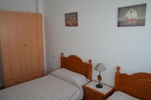 Postel nebo postele na pokoji v ubytování Hnos Navarrete