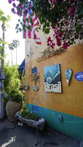 a building with signs on the side of it at Villa Brasil Motel in Los Angeles