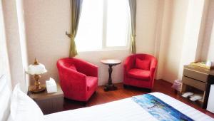 Een zitgedeelte bij Red Roof B&B
