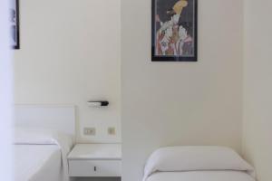 Postel nebo postele na pokoji v ubytování Residence Hotel Villa Mare