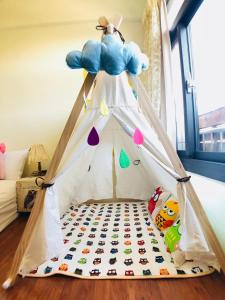 a childs play tent in a room at E-Phone Homestay in Ji'an