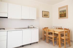 Kuchyň nebo kuchyňský kout v ubytování Residence Hotel Villa Mare