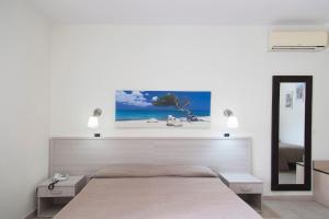Postel nebo postele na pokoji v ubytování Residence Hotel Villa Mare
