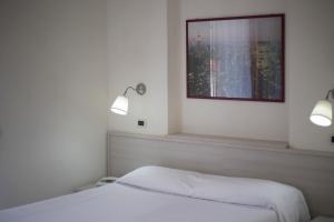Postel nebo postele na pokoji v ubytování Residence Hotel Villa Mare