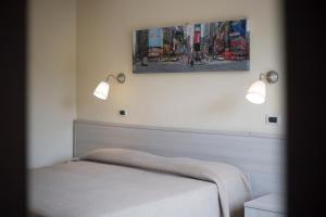 Postel nebo postele na pokoji v ubytování Residence Hotel Villa Mare
