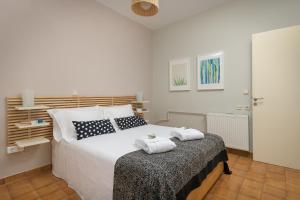 Кровать или кровати в номере Melita City Apartment