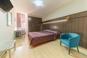 Postel nebo postele na pokoji v ubytování Hotel Monreal Jumilla