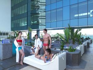 a group of people standing on the rooftop of a building at The Zuri Whitefield Bengaluru in Bangalore