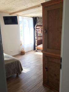 Postel nebo postele na pokoji v ubytování La Ferme des Arêtes