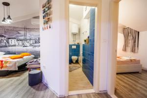 Postel nebo postele na pokoji v ubytování Apartments MB