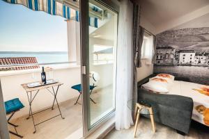 Postel nebo postele na pokoji v ubytování Apartments MB