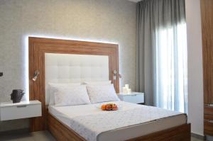 Łóżko lub łóżka w pokoju w obiekcie Aqua Luxury Villas