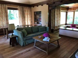 Posedenie v ubytovaní The Golf Club Guest House