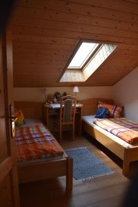 Giường trong phòng chung tại Ferienwohnung Grubinger