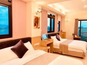 Letto o letti in una camera di Sweetlight B&B