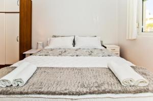 Säng eller sängar i ett rum på Apartments Ana I