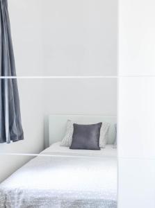 Кровать или кровати в номере Apartments Tonka Centar