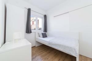 Кровать или кровати в номере Apartments Tonka Centar