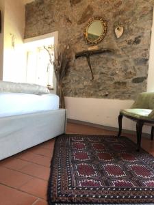 A bed or beds in a room at B&B Puccini