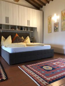 A bed or beds in a room at B&B Puccini