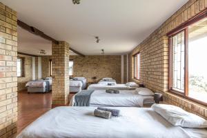 Postel nebo postele na pokoji v ubytování Surf Lodge South Africa + 37 fotografií