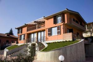 a house with a fence in front of it at B&B Sole Luna in Perugia