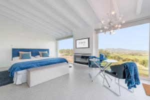 A bed or beds in a room at Cas Cabo Nou Agroturismo Adults Only Még 37 kép