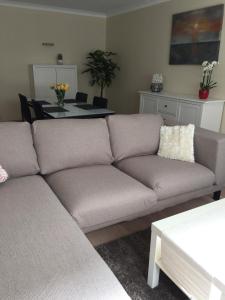 
a living room filled with furniture and a couch at Apartments Iris in Ostend
