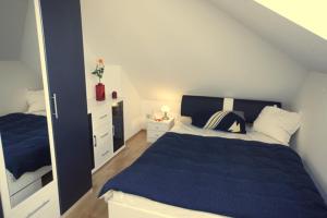 Ein Bett oder Betten in einem Zimmer der Unterkunft Homburg/Limbach