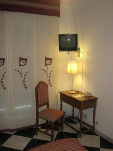 TV a/nebo společenská místnost v ubytování Hotel Mediante